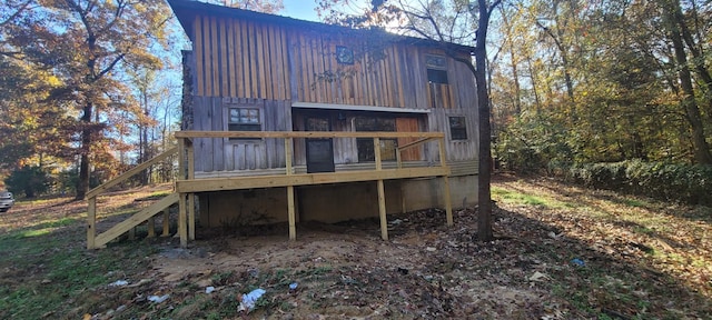 180 Mount View Estates Ln, Holladay, TN 38341 - back of property featuring a wooden deck, board and batten siding, and stairway
