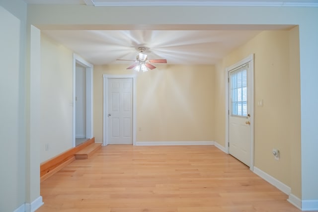 interior space featuring light hardwood / wood-style floors and ceiling fan