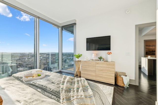 1616 W End Ave Unit 2911, Nashville, TN 37203 - bedroom featuring dark wood-type flooring, expansive windows, and access to outside