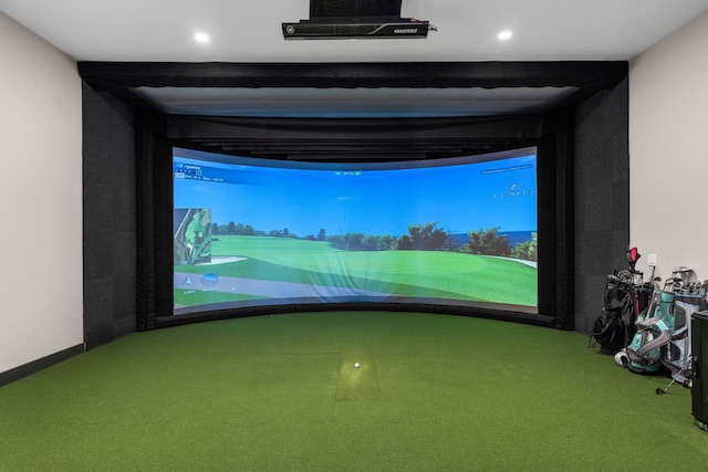 rec room featuring golf simulator and carpet