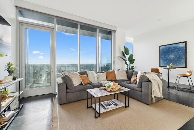 living room featuring parquet flooring