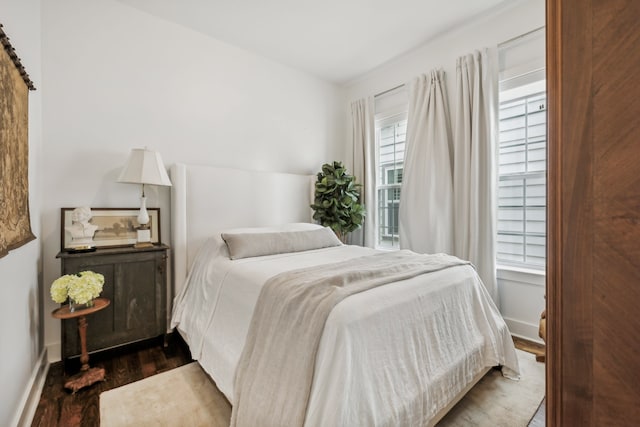 bedroom featuring dark hardwood / wood-style floors