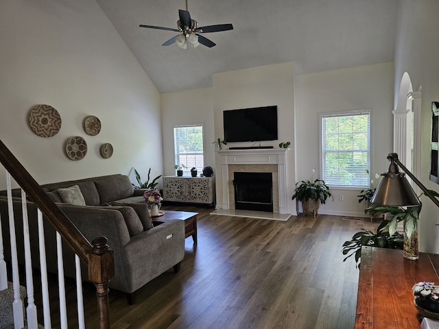 living room with high vaulted ceiling, dark hardwood / wood-style floors, and ceiling fan