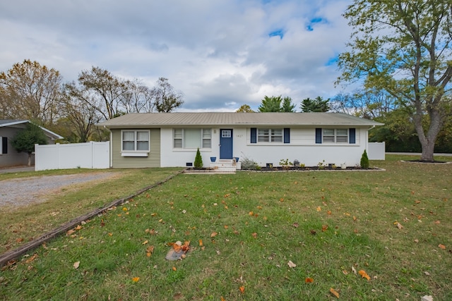 single story home with a front yard