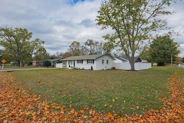 exterior space with a lawn