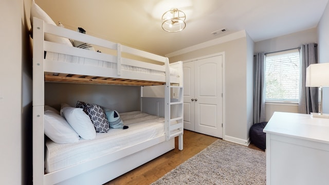 bedroom with light hardwood / wood-style floors