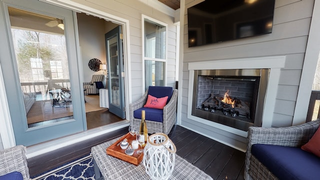 interior space featuring an outdoor fireplace