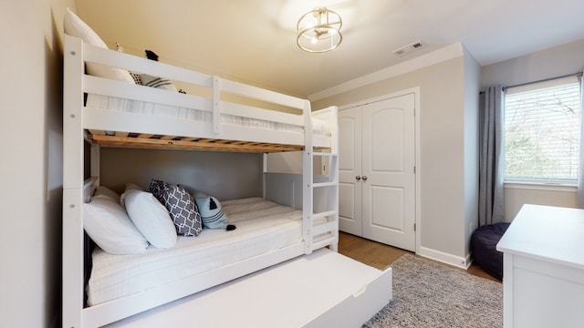 bedroom featuring wood-type flooring