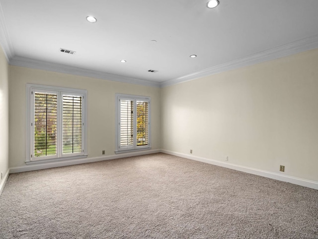 carpeted empty room with ornamental molding