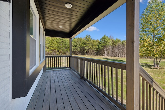 deck featuring a lawn