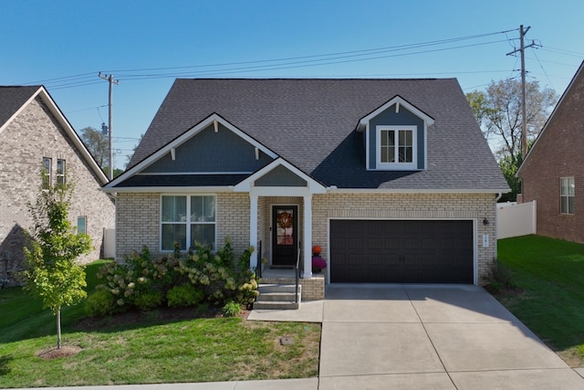 view of front facade with a garage and a front yard