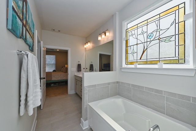 bathroom featuring a bathtub and vanity