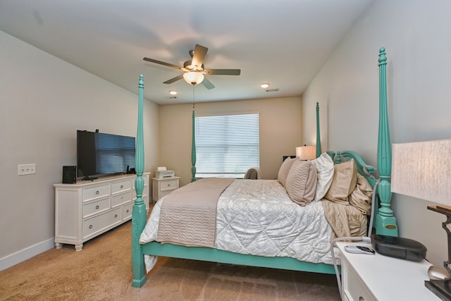 carpeted bedroom featuring ceiling fan