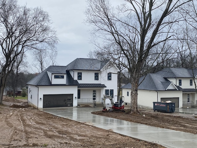 view of front of property featuring a garage