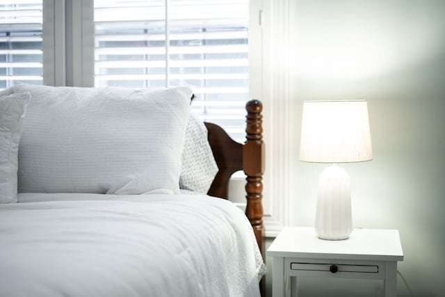 bedroom featuring multiple windows