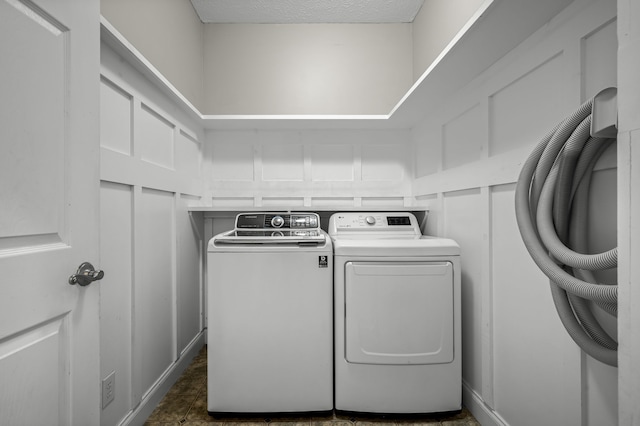 laundry room featuring washing machine and dryer