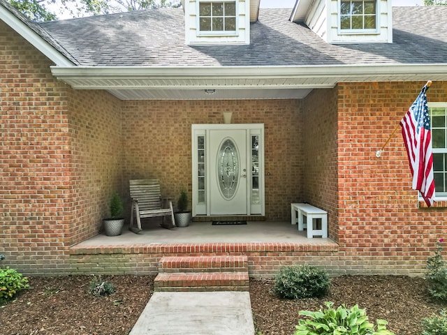 doorway to property featuring a porch