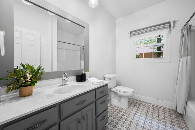 full bathroom featuring vanity, tile patterned floors, toilet, and shower / bathtub combination with curtain