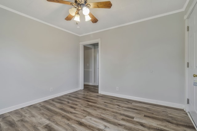 unfurnished room with hardwood / wood-style flooring, ceiling fan, and crown molding