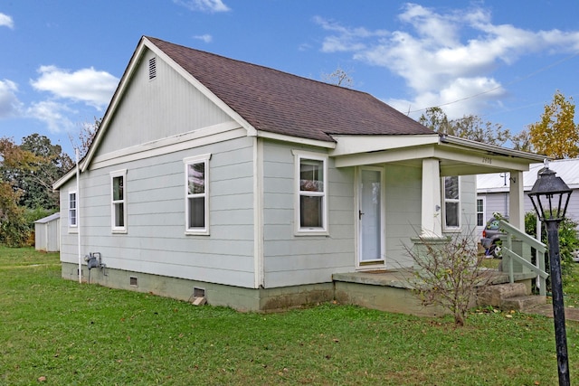 exterior space with a yard