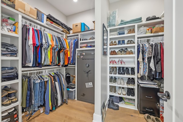 spacious closet featuring light hardwood / wood-style floors