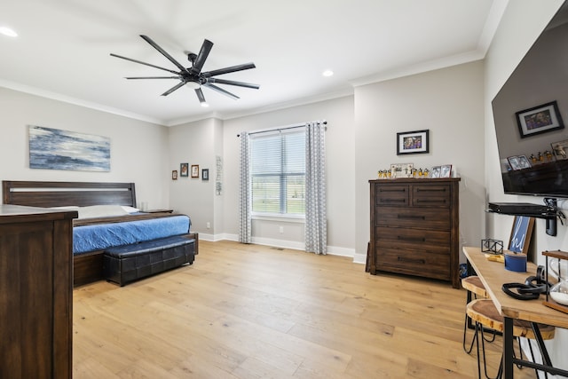 bedroom with ornamental molding, light wood-type flooring, and ceiling fan