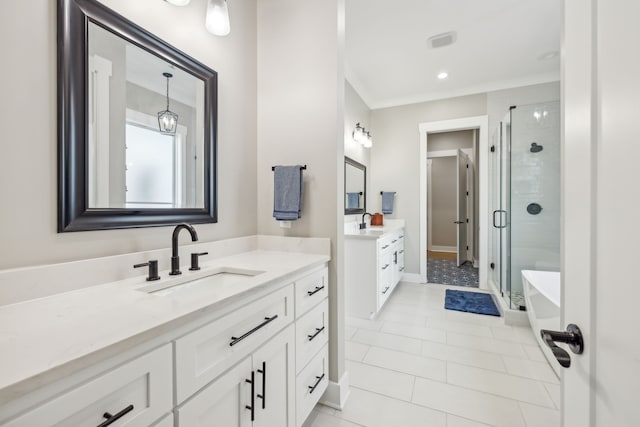 bathroom with independent shower and bath, vanity, and tile patterned floors