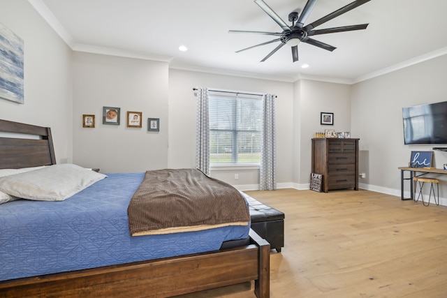 bedroom featuring ceiling fan, light wood-type flooring, and ornamental molding