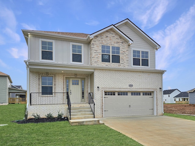 view of front of property with a garage, a porch, and a front yard