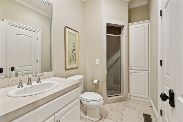 bathroom with toilet, tile patterned floors, walk in shower, and vanity