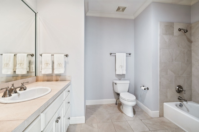 full bathroom with tiled shower / bath, tile patterned floors, vanity, toilet, and ornamental molding