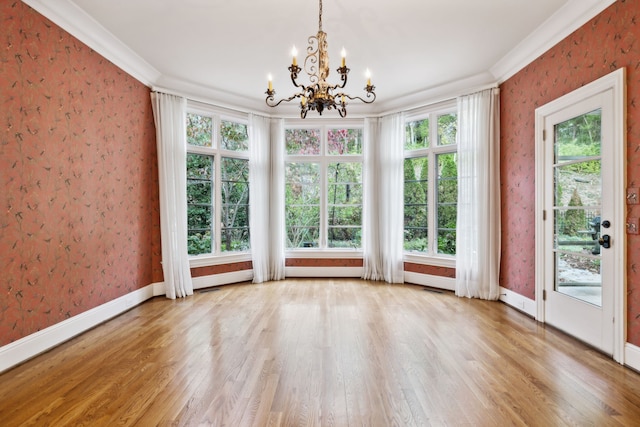 unfurnished sunroom with a chandelier