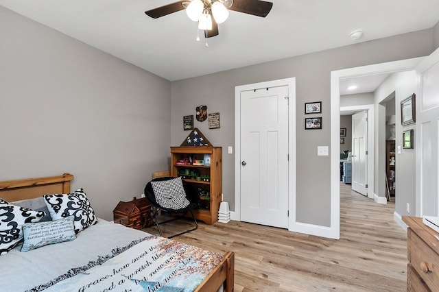 bedroom featuring ceiling fan and light wood-type flooring