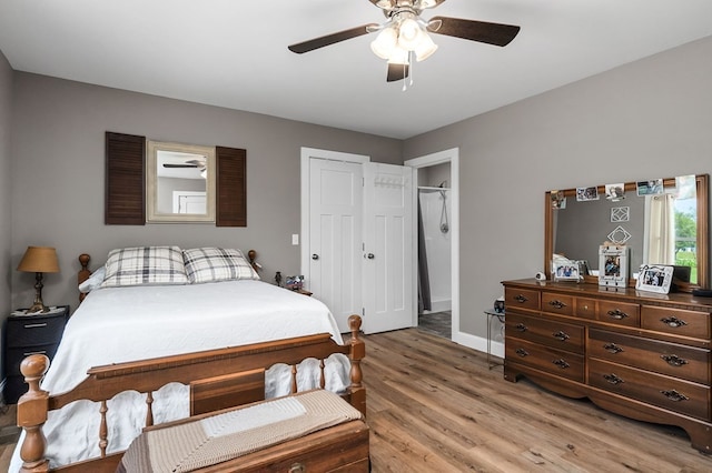 bedroom featuring light hardwood / wood-style flooring and ceiling fan