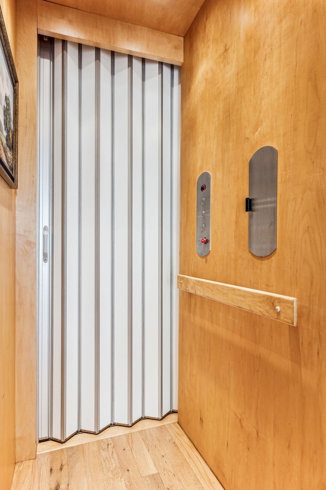 interior details featuring wood-type flooring