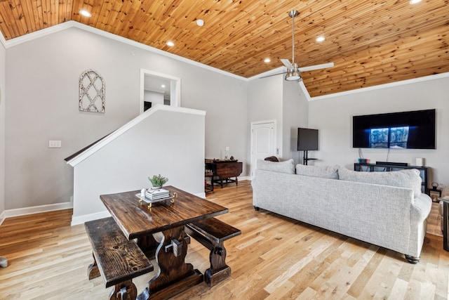 living room with wooden ceiling, high vaulted ceiling, ceiling fan, crown molding, and light hardwood / wood-style flooring