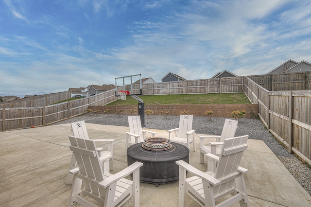 view of patio / terrace featuring an outdoor fire pit