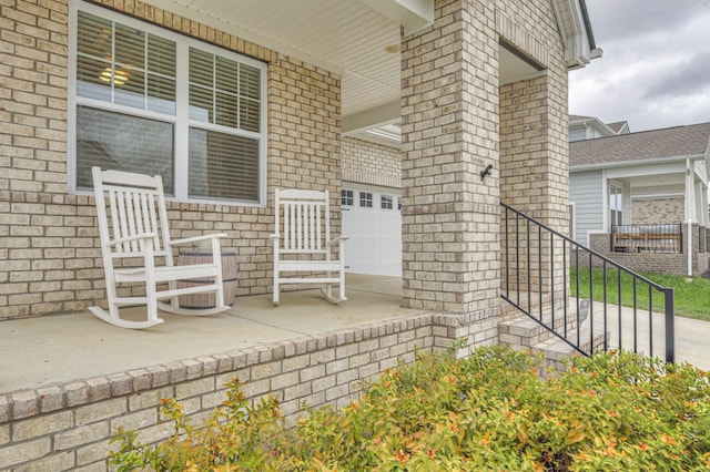 view of patio / terrace featuring a garage