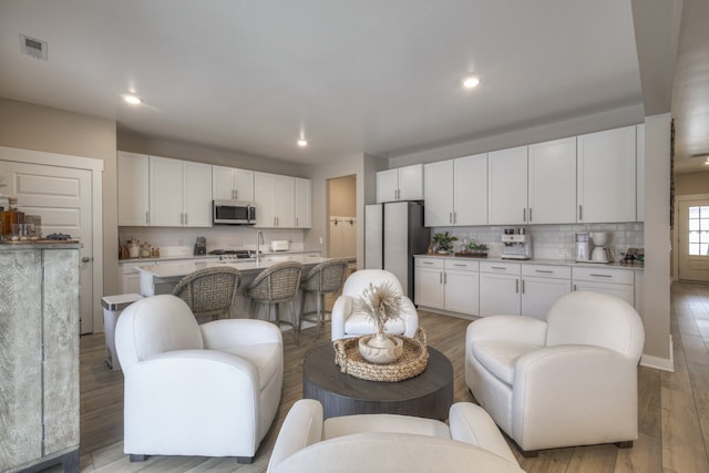 living room featuring light hardwood / wood-style flooring