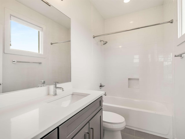 bathroom with toilet, vanity, shower / bathtub combination, and tile patterned floors