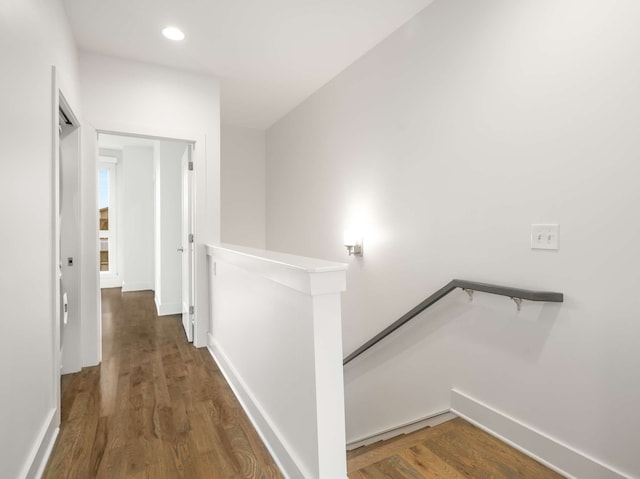 hall with dark wood-type flooring