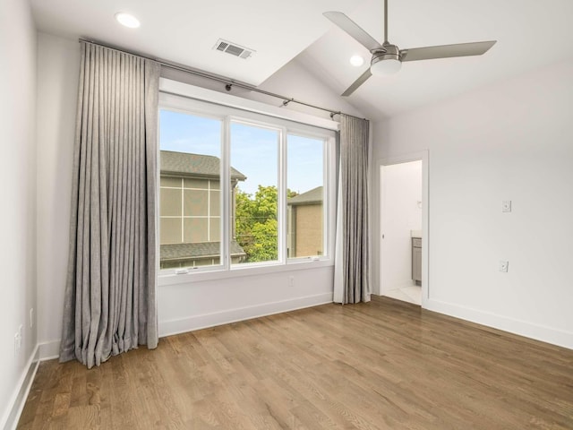 unfurnished room with a ceiling fan, light wood-style flooring, vaulted ceiling, baseboards, and recessed lighting
