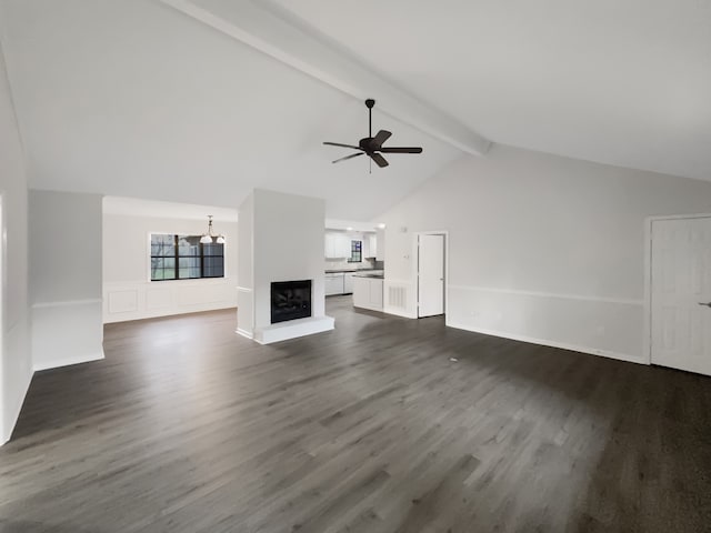 unfurnished living room featuring high vaulted ceiling, beamed ceiling, ceiling fan, and dark hardwood / wood-style floors