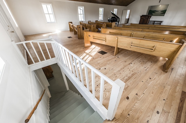 stairs featuring wood-type flooring