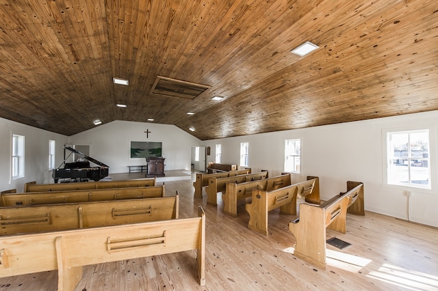 interior space featuring plenty of natural light, lofted ceiling, wooden ceiling, and light hardwood / wood-style flooring