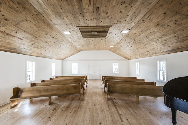 miscellaneous room with a wealth of natural light, vaulted ceiling, wood ceiling, and light hardwood / wood-style flooring