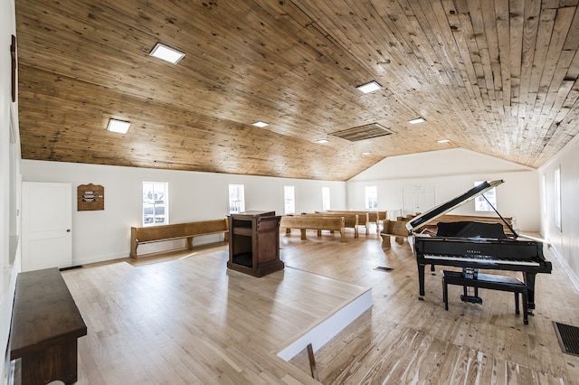 miscellaneous room with vaulted ceiling, wooden ceiling, and light hardwood / wood-style flooring