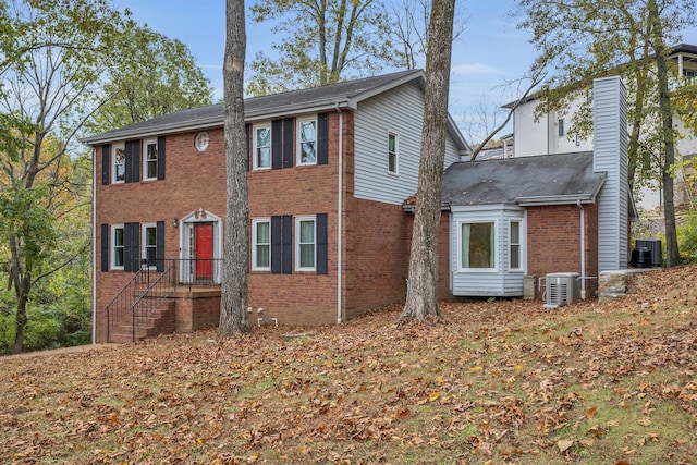 view of home's exterior with central AC