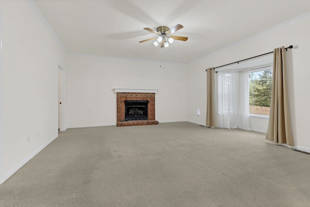 unfurnished living room with a brick fireplace, ceiling fan, light colored carpet, and ornamental molding