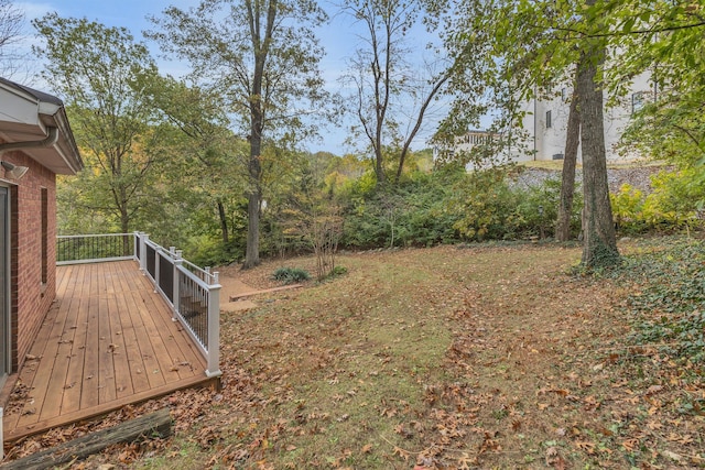 view of yard featuring a deck